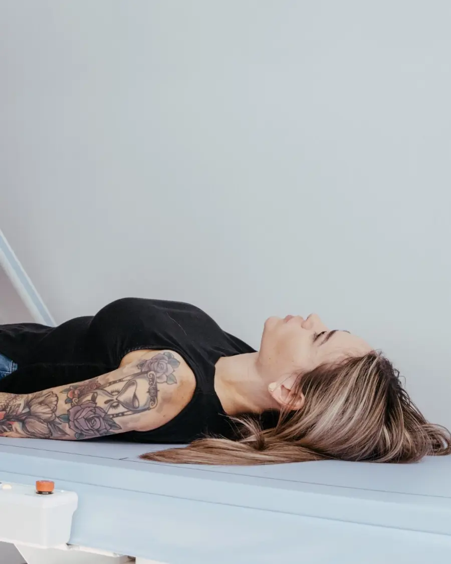 Lying on the DEXA table during a scan
